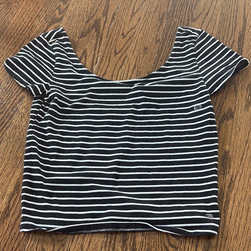 Black and white crop t-shirt with off the shoulder neckline and short sleeves